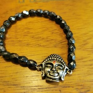Stretch Faceted Hematite and Brushed Silver Tone Buddha Bracelet